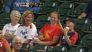 Astros fan licks foul ball, gets slapped