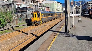 7502次R165單柴電頭+E318單電頭+數節空石渣斗車+數節敞車+一守車長編混編貨列，和4828次八斗子發車經由平溪線開往菁桐的DRC1031+DRC1025+DRC1034三節DRC原色柴油客車