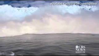 Caught on tape: 'iceberg tsunami' crashes into boat