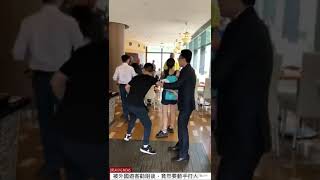 PRC Chinese tourist wanna beat a US tourist after being caught spitting in a Hong Kong 5 star Hotel