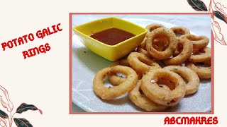 POTATO GARLIC RINGS ||Easy\u0026Crispy Potato garlic rings||പൊട്ടറ്റോ ഗാർലിക് റിംഗ്സ്‌ ||recipe abcmakers