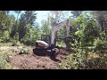 bobcat e85 moving stumps and dirt