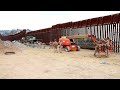 marines fortify border wall with concertina wire in california