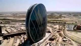 Aldar HQ   The worlds first circular skyscraper Abu Dhabi Truly Amazing   www SimplyAbuDhabi com mp4