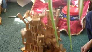 Wood block tower implosion