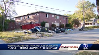 Trash piles up at vacant apartments