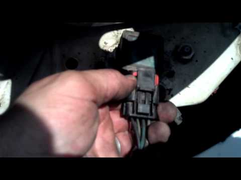 Where is the radiator fan relay on a 2000 Dodge Caravan?