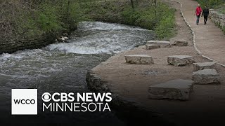 Minnehaha Creek’s rising water level has onlookers engrossed, residents worried