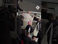 moment pope s cap blows away during audience