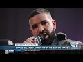 Drake hit by phone thrown on stage during concert