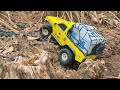 pickup truck carrying full load of goods through extreme ravine rc car mudding crawler load 4