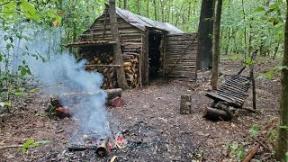 Bushcraft Log Cabin Camping in Rain Storm - Repairing and upgrading my survival shelter with my son