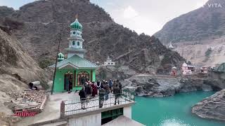 A picturesque view of Ziarat Sharaf and temples across the river on either side of the Kishtwar