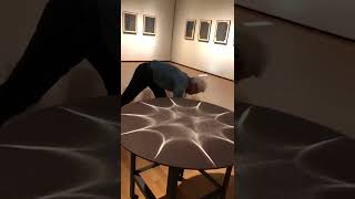 This is artist Kenichi Kanazawa producing geometric patterns with only sound as a tool