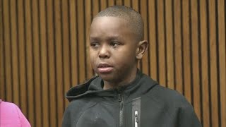 Boy who lost his father in shooting speaks at man's sentencing