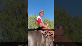 He CAN’T drink beer on a horse