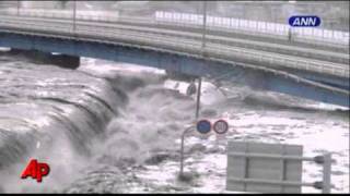 Raw Video: Tsunami Wave Smashes Boats and Cars