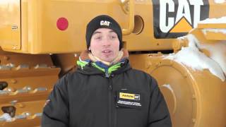 Finning Mechanic Servicing Cat® Equipment in Antarctica