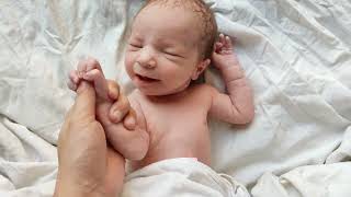 Beautiful Smiling blonde newborn Baby girl just after birth #baby #cute #blonde