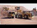 caterpillar tinaja hills proving grounds 995 wheel loader loads 793 electric truck