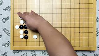 围棋行棋步法——二间高夹后的双飞燕