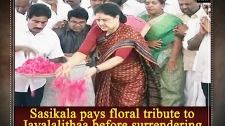 Sasikala pays floral tribute to Jayalalithaa before surrendering  - ANI #News