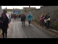 halloween revelers of glastonbury england march to the tor