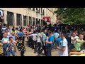 students mevakshei hashem dance in front of their school