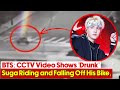 BTS: CCTV Video Shows 'Drunk' Suga Riding and Falling Off His Bike,