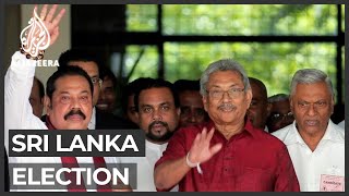 Rajapaksa brothers win by landslide in Sri Lanka's election