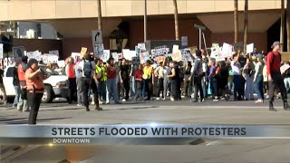 Downtown Tucson streets flooded with protesters