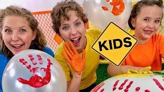 Color Balloon Paint Hand Prints with Sign Post Kids!