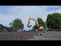 excavator vs. asphalt who wins unloading cat 310 miniexcavators nzwork excavator jcb jcbex