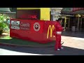 elvis in red jumpsuit in front of mcdonalds in vegas