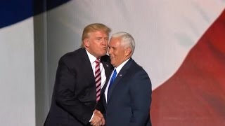 Donald Trump, Mike Pence share awkward almost-kiss on stage at Republican National Convention