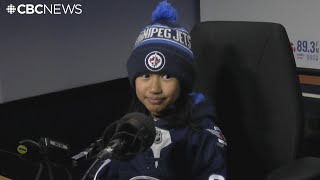 8 year old laces up the skates for Filipino Heritage Night | Winnipeg Jets host annual event