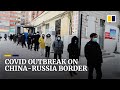 People line up in snow for Covid-19 testing amid outbreak in northern China border city