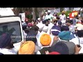 mourners line roads as badal s coffin makes final journey cremation on thursday