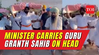 Flood water enters Gurdwara, Minister Laljit Singh Bhullar carries \