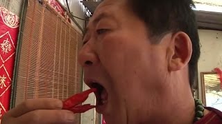 Man in China eats 2kg of chillies a day