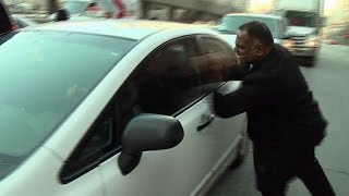 Caught on camera: Taxi driver confronts Uber driver