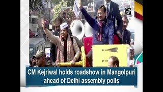 CM Kejriwal holds roadshow in Mangolpuri ahead of Delhi assembly polls