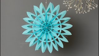 How to make a 3D paper snowflake for Christmas decorations.