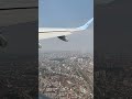 tuifly belgium take off over the city of antwerp with e jet 190