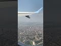 tuifly belgium take off over the city of antwerp with e jet 190