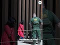 Migrants detained by US Border Patrol agents after crossing US-Mexico border