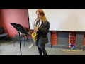 new era music school student teagan playing saxophone.