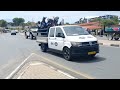 the official ceremonial procession of founding father dr sam nujoma making its way through