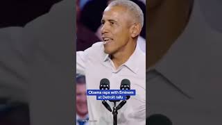 Obama RAPS on stage after Eminem introduces him at a rally in Detroit, Michigan