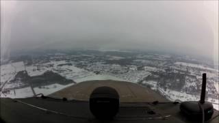 Landing at Akron/Canton Ohio (KCAK).... ILS 23 Approach down thru clouds and light snow